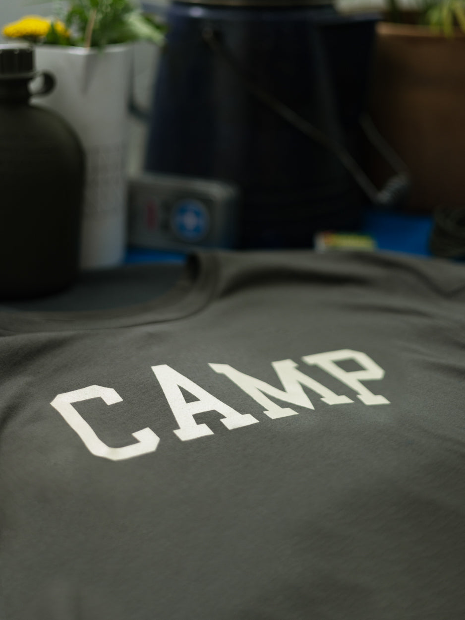 Close-up of the breathable cotton fabric and printed graphic on the Camp T-Shirt.